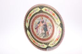 A VIENNA STYLE CABINET PLATE, CIRCA 1900, decorated with a crowned prince, maiden and putto, blue