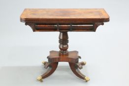 AMENDMENT A REGENCY GONCALO ALVES FOLDOVER CARD TABLE, the crossbanded top with rounded corners