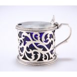 A VICTORIAN PIERCED SILVER MUSTARD POT, by Charles Stuart Harris, London 1894, of cylindrical