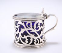 A VICTORIAN PIERCED SILVER MUSTARD POT, by Charles Stuart Harris, London 1894, of cylindrical