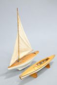 TWO VINTAGE WOODEN MODEL BOATS, including one with sail. Longest 98.5cm