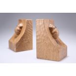 ROBERT THOMPSON OF KILBURN A PAIR OF MOUSEMAN OAK BOOKENDS, of characteristic form, adzed, carved