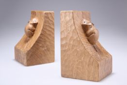 ROBERT THOMPSON OF KILBURN A PAIR OF MOUSEMAN OAK BOOKENDS, of characteristic form, adzed, carved