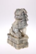 A CHINESE SOAPSTONE MODEL OF A DOG OF FO, LATE 19TH CENTURY. 17.5cm high