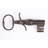 A RARE EARLY 19TH CENTURY TURNKEY'S KEY PISTOL, complete with trigger/igniter. Length12cm The