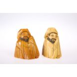 TWO JAPANESE IVORY FIGURES, 19TH CENTURY, carved as sleeping scholars. Taller 7cm highThe absence of