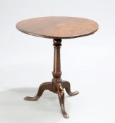 A GEORGE III MAHOGANY TILT-TOP TRIPOD TABLE, 18TH CENTURY, the circular one-piece top raised on a