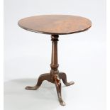 A GEORGE III MAHOGANY TILT-TOP TRIPOD TABLE, 18TH CENTURY, the circular one-piece top raised on a