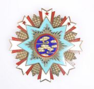 A 20TH CENTURY CHINESE BREAST STAR OF MULTI-PIECE CONSTRUCTION, with enamelling and pin back,