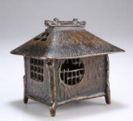 A JAPANESE BRONZE INCENSE BURNER, LATE 19TH CENTURY, in the form of a hut. 10cm wide
