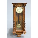 A LARGE 19TH CENTURY WALNUT VIENNA PATTERN WALL CLOCK, two-weight driven movement, the dial with