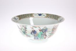 A CHINESE FAMILLE VERTE BOWL, circular with everted rim, the exterior painted with figures in the