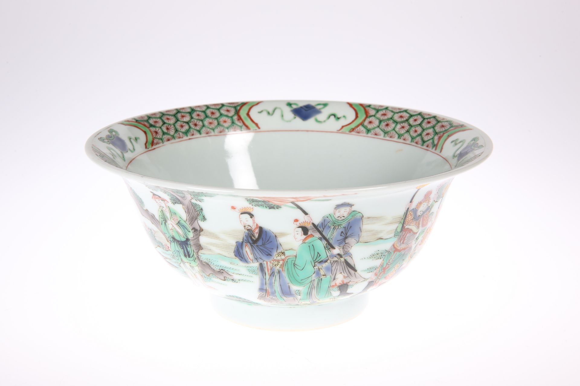 A CHINESE FAMILLE VERTE BOWL, circular with everted rim, the exterior painted with figures in the