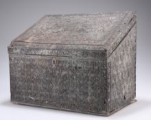 A 19TH CENTURY CARVED HARDWOOD BOX, with hinged slant front lid. 31cm wide