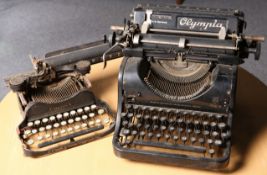 ~ TWO TYPEWRITERS FROM A COUNTRY HOUSE, the first Olympia Mod 8, the second a small example by