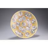 A CHINESE 'MEDALLIONS' DISH, circular, painted with scattered medallions filled with birds, prunus