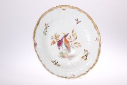 A MEISSEN OUTSIDE DECORATED PLATE, LATE 19TH CENTURY, shaped circular form with spiral moulding,