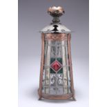 AN ARTS AND CRAFTS COPPER LANTERN, tapering cylindrical form, the three lead-glazed panels centred