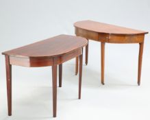 ~ TWO GEORGE III MAHOGANY DEMILUNE SIDE TABLES, the first with satinwood banded edge and square-