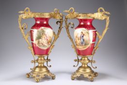 A PAIR OF 'VIENNA' GILT-METAL MOUNTED PORCELAIN VASES, CIRCA 1900, each painted with Classical