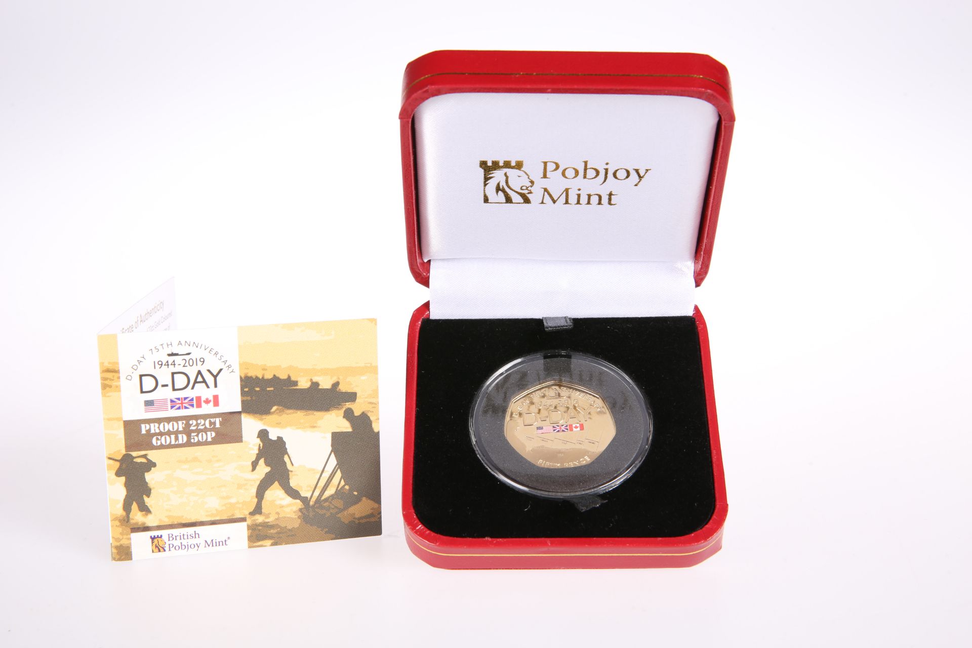 A POBJOY 22 CARAT GOLD D-DAY 75TH ANNIVERSARY FIFTY PENCE PROOF COIN, in plastic capsule, with