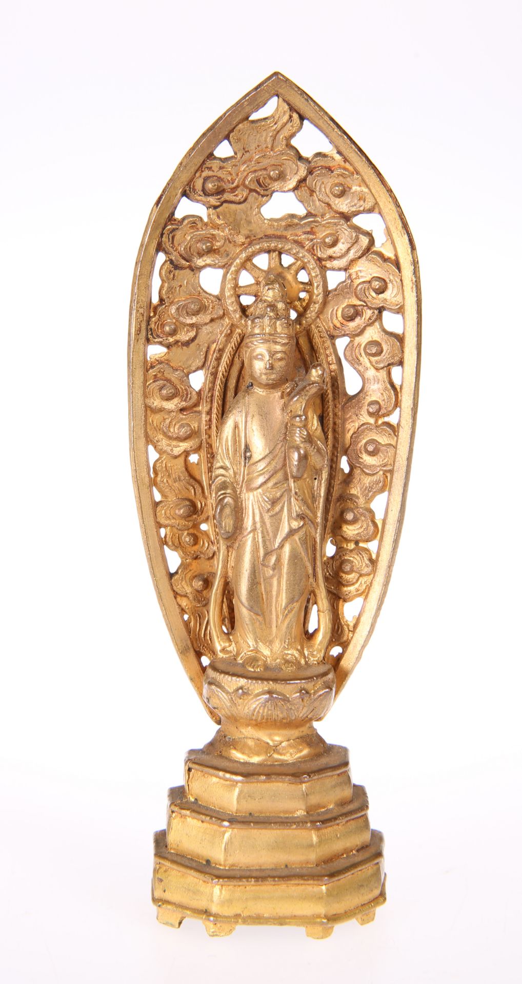 A CHINESE GILT-BRONZE FIGURE OF BUDDHA, 19TH CENTURY, modelled standing on a lotus plinth and