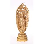 A CHINESE GILT-BRONZE FIGURE OF BUDDHA, 19TH CENTURY, modelled standing on a lotus plinth and