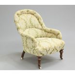 A VICTORIAN MAHOGANY AND UPHOLSTERED ARMCHAIR, with button-back and arms, raised on turned legs with