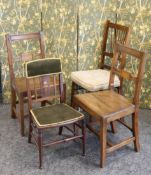A PAIR OF EARLY 19TH CENTURY OAK COUNTRY CHAIRS, each with plank seat; together with TWO FURTHER
