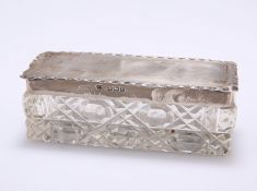 A CUT-GLASS BOX WITH SILVER LID, by Williams (Birmingham) Ltd, Birmingham 1910, the rectangular