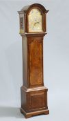 A MAPPIN & WEBB WALNUT THREE-TRAIN LONGCASE CLOCK, the thirteen inch break arch dial with switches