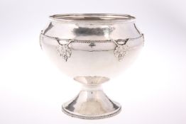 AN ARTS AND CRAFTS SILVER BOWL, by Philip Hanson Abbot, Birmingham 1918, circular footed form, the