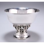 A MID-20TH CENTURY GEORG JENSEN DANISH SILVER FOOTED BOWL, the lightly planished bowl with everted
