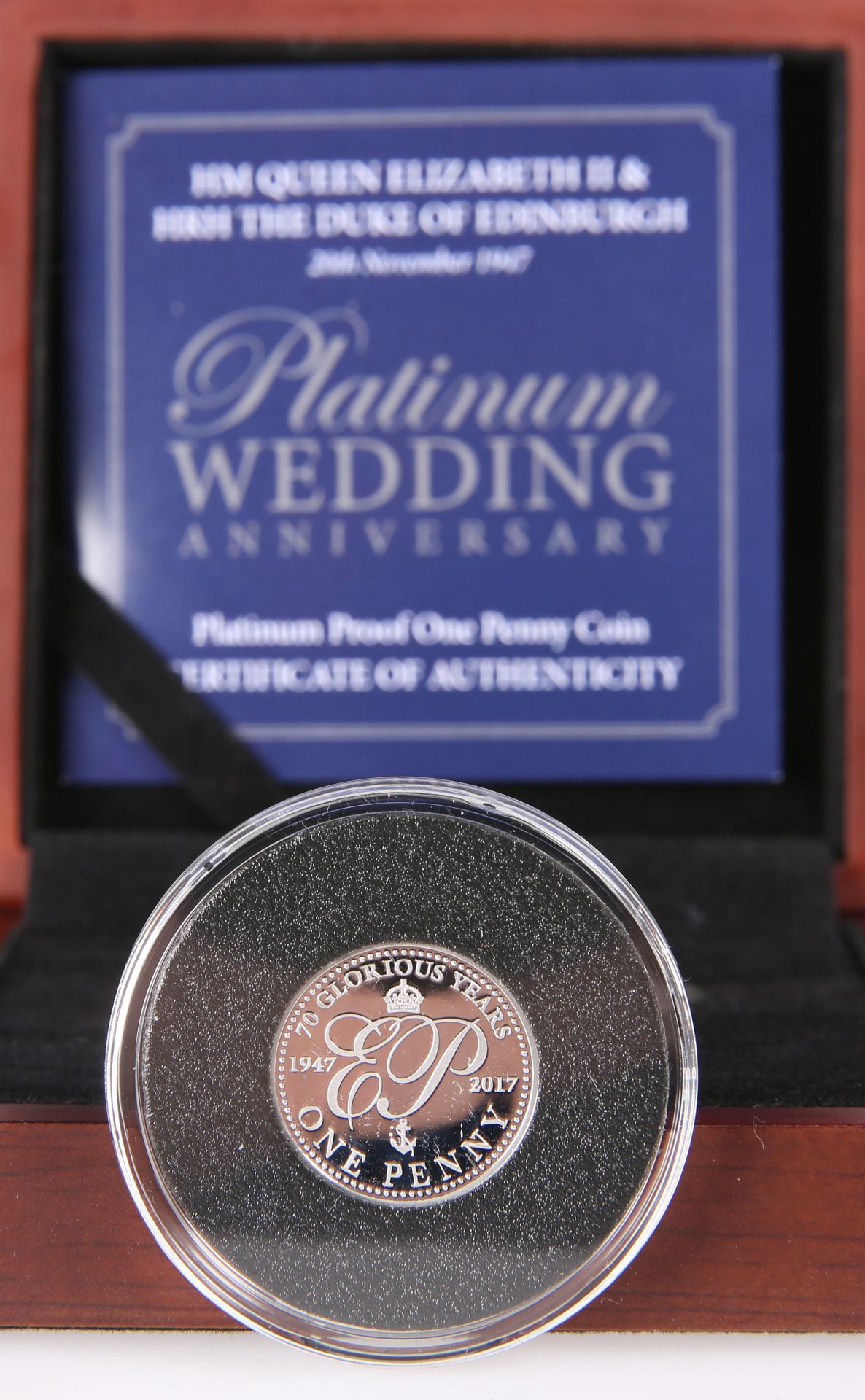 A 2017 PLATINUM PROOF ONE PENNY COIN, "HM QUEEN ELIZABETH II & HRH THE DUKE OF EDINBURGH PLATINUM