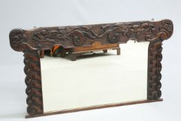 A LARGE CELTIC REVIVAL CARVED OAK OVERMANTEL MIRROR, CIRCA 1900, signed FW and dated 1900, carved