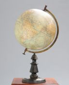 A FRENCH TERRESTRIAL GLOBE BY J FOREST, spinning on a brass meridian raised on a turned wooden base.