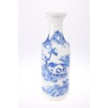 A CHINESE BLUE AND WHITE VASE, painted in the round with figures in a landscape, bears underglaze