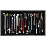 A COLLECTION OF VICTORIAN AND LATER GLASS NOVELTIES, including dip pens, spoons, etc., some with