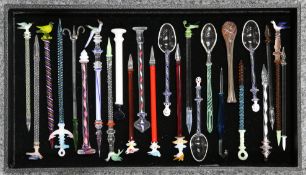 A COLLECTION OF VICTORIAN AND LATER GLASS NOVELTIES, including dip pens, spoons, etc., some with