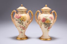 A PAIR OF ROYAL WORCESTER BLUSH IVORY POT POURRI VASES AND COVERS, of two-handled baluster form,