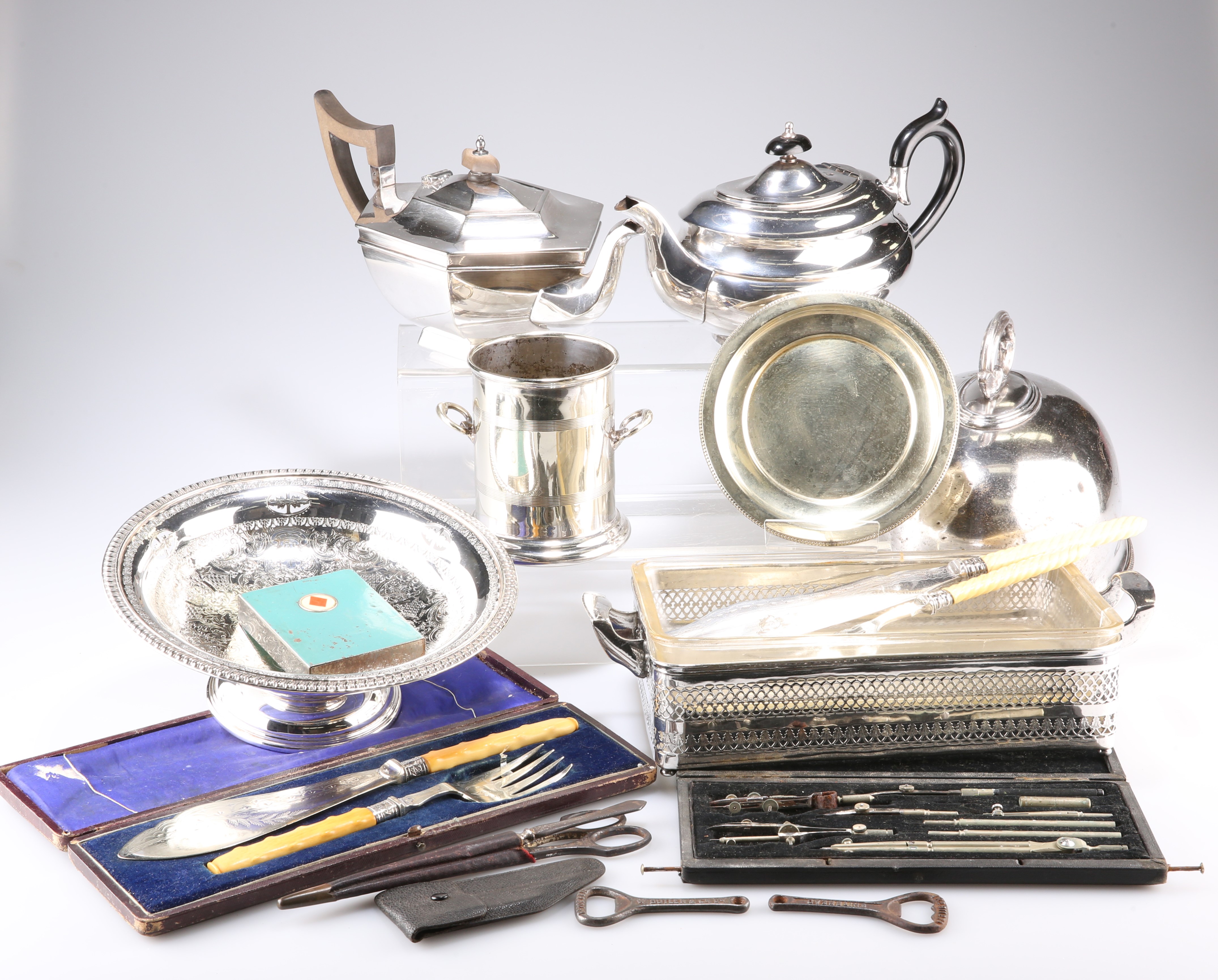 A LARGE COLLECTION OF SILVER-PLATE, including teapots, dish cover, etc.