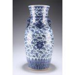 A LARGE MING-STYLE BLUE AND WHITE BALUSTER VASE, LATE QING DYNASTY, applied with shishi to the