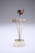 AN ART DECO SILVER, ENAMEL AND ONYX COCKTAIL STAND, by C B & S, London 1927, the carousel form stand