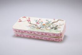 A CHINESE FAMILLE ROSE INK BOX, rectangular with inverted corners, the cover painted with rockwork