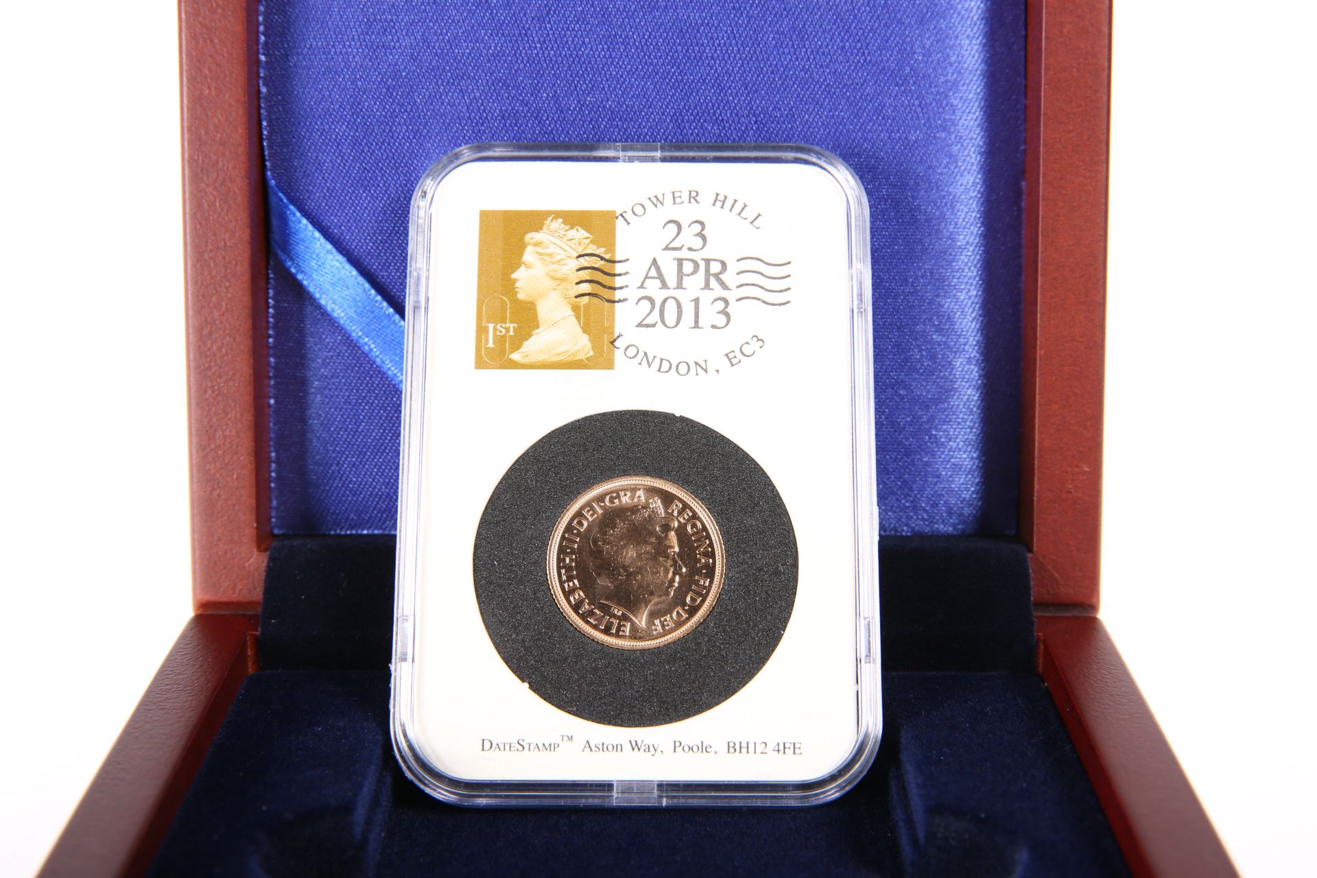 A 2013 ST GEORGE'S DAY FULL SOVEREIGN, in DateStamp capsule dated 23 Apr 2013, in wooden