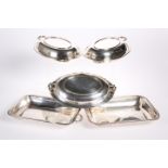 A GROUP OF FOUR SILVER-PLATED ENTREE DISHES, comprising three oval and one rectangular. (4)