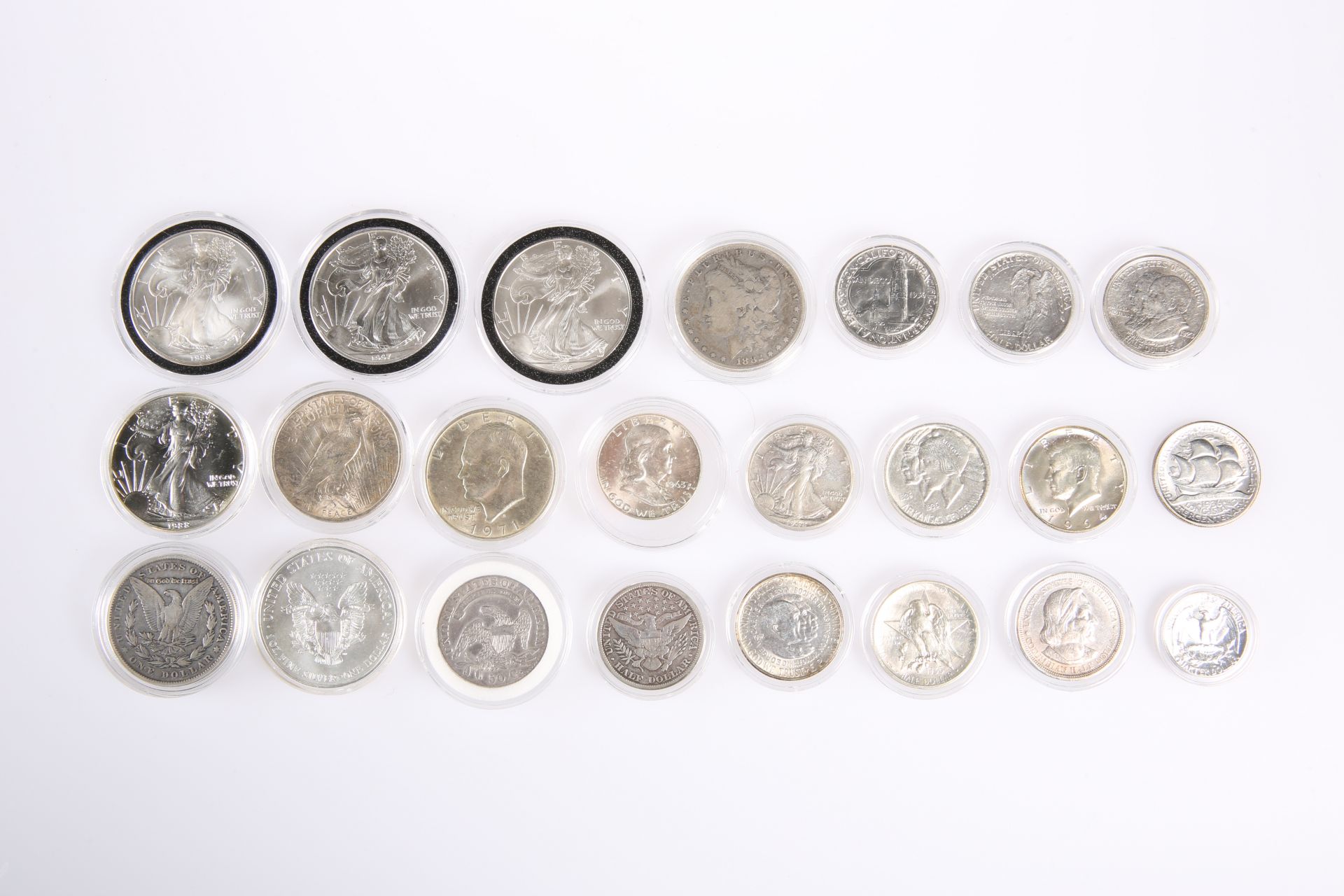 A COLLECTION TWENTY-THREE AMERICAN SILVER COINS. (23)The absence of a Condition Report does not