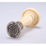 A 19TH CENTURY IVORY-HANDLED SEAL, the white-metal matrix with Royal Coat of Arms of Spain with