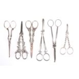 A GROUP OF SIX PAIRS OF SILVER-PLATED GRAPE SCISSORS. (6)