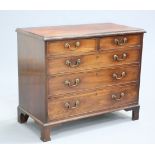 A GEORGE III MAHOGANY CHEST OF DRAWERS, the moulded rectangular top above two short over three